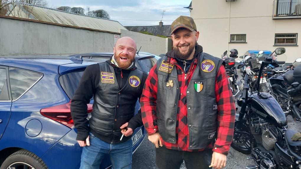 A group of bikers riding together, symbolizing camaraderie and adventure.